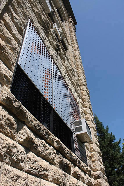 Variant Exposure Intelligent Light Screen mounted on a window