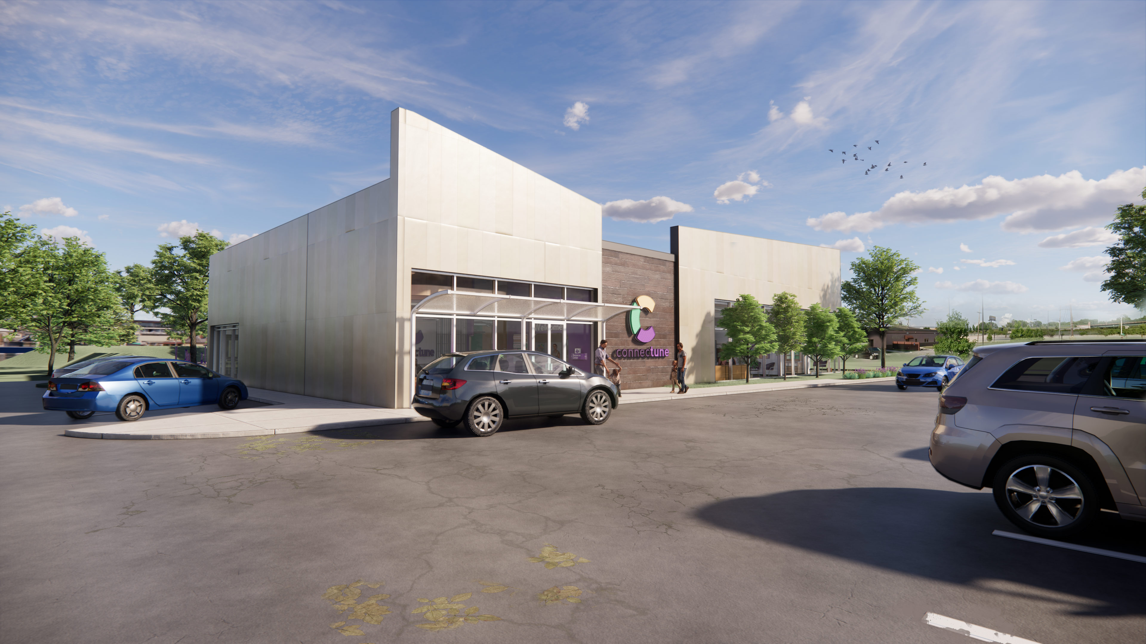 Connectune: Music as an Integrated Spatial Component Entrance outside view of the Connectune building, showing the entrance, parking lot, and landscaping